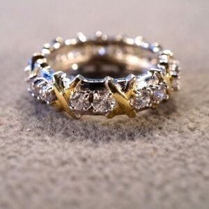 Thick white topaz sterling silver and gold wedding band.. Size 6.5